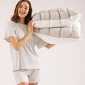 Comforter folded and carried